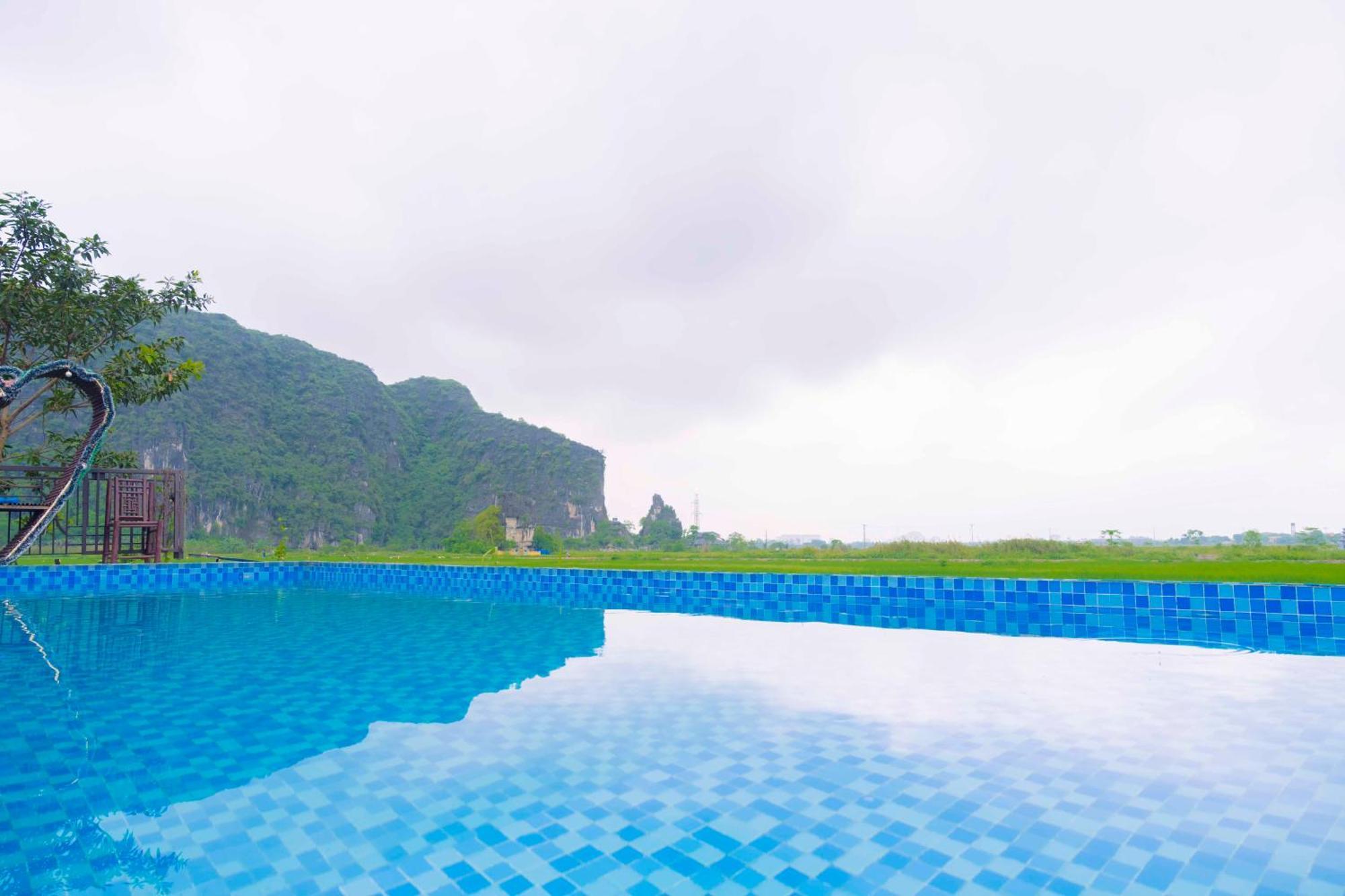 Апартаменты Papaya Bungalow & Rice Fields Ниньбинь Экстерьер фото